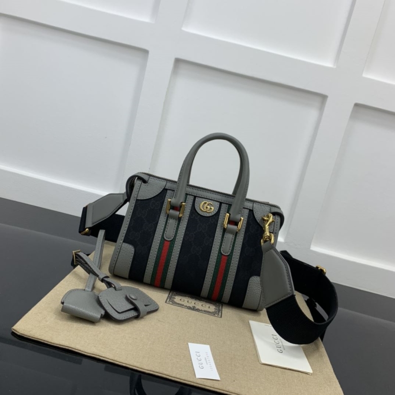 G*u*i top handle bags